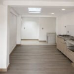 Sala comedor de apartamento remodelado en Palermo Manizales