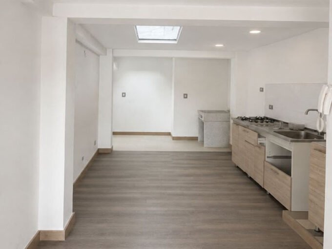 Sala comedor de apartamento remodelado en Palermo Manizales